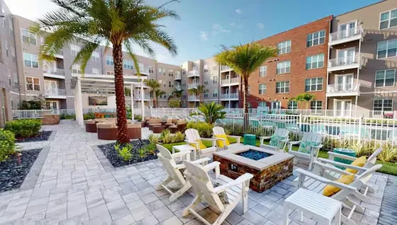 Courtyard with fire pit, chairs and pool in the Clear Lake area, West Palm Beach
